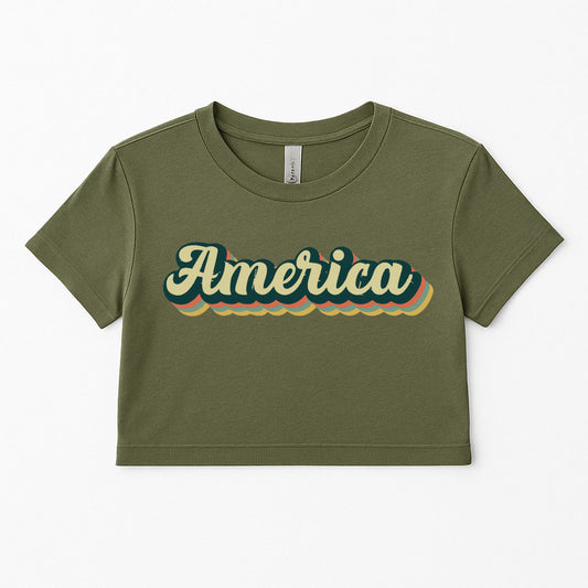 Green t-shirt with 'America' print on a white background