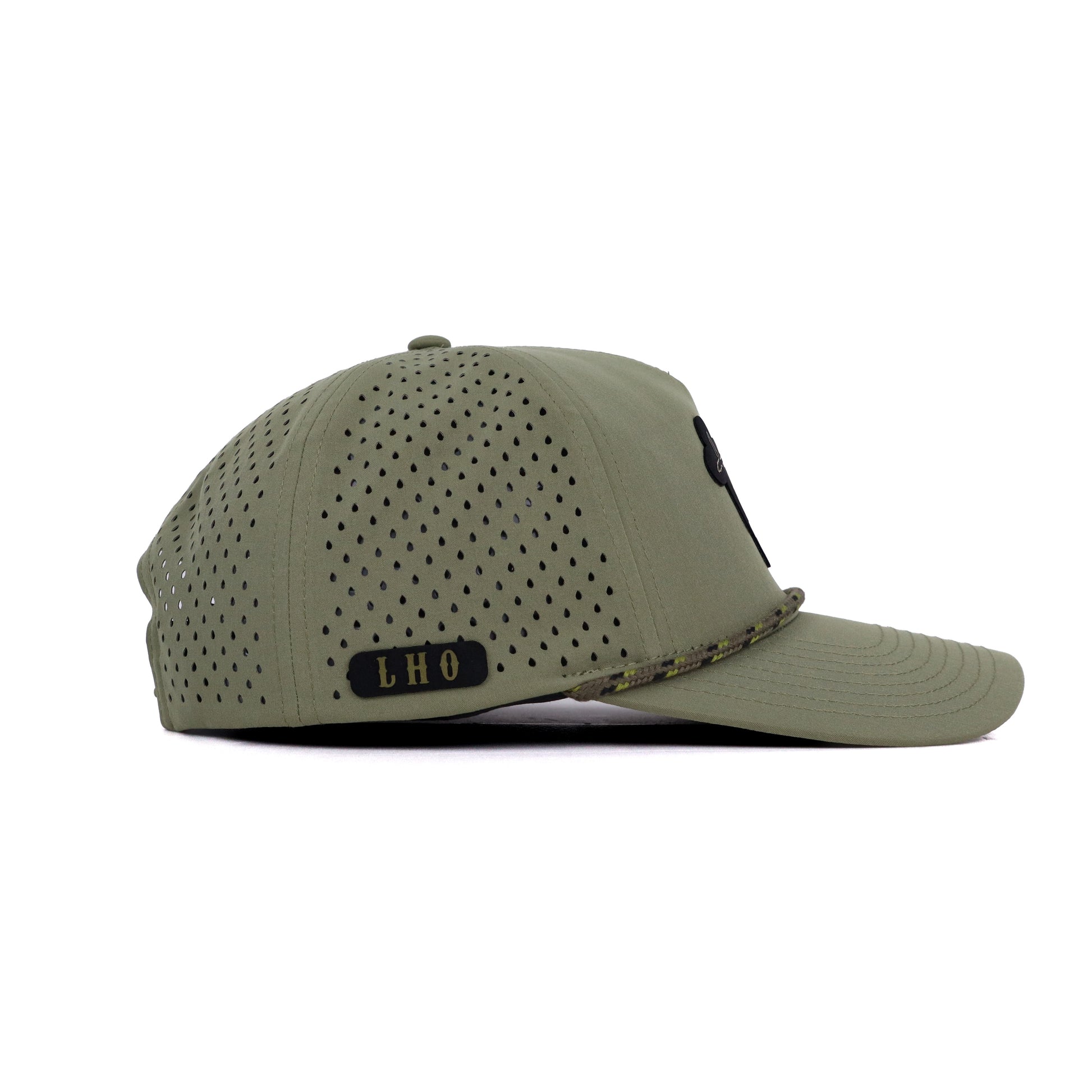 Green baseball cap with perforated design on a white background