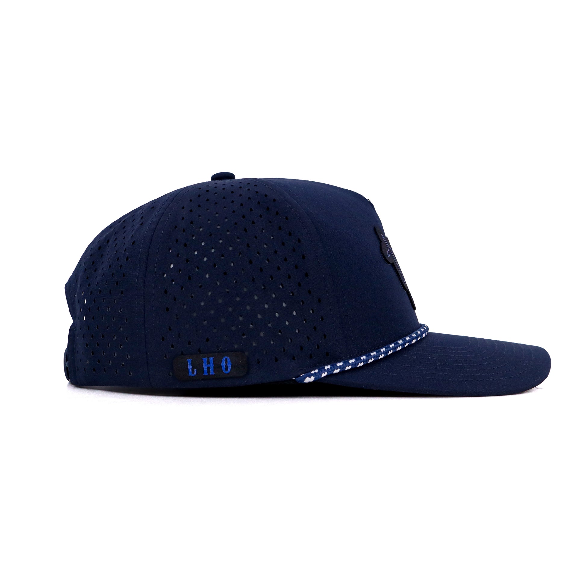 Navy blue cap with perforated design on a white background