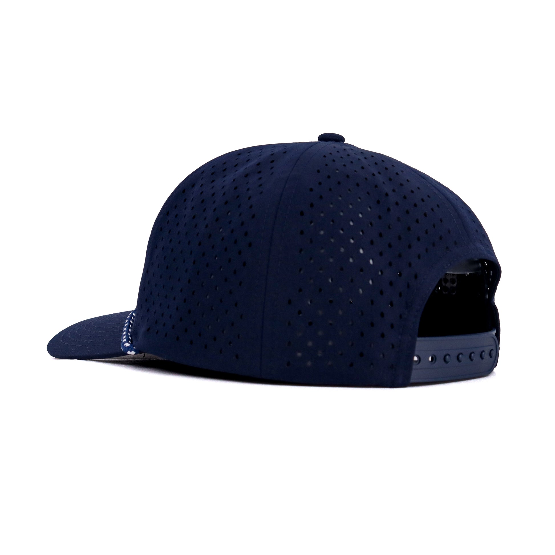 Navy blue cap with perforated design on a white background