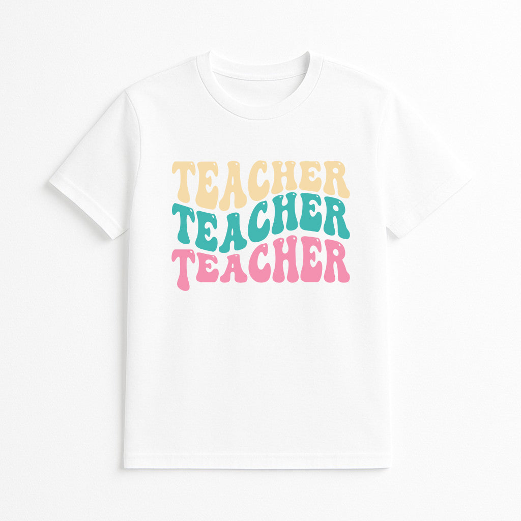 White t-shirt with 'Teacher Teacher Teacher' text in colorful letters on a white background