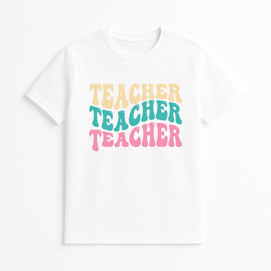 White t-shirt with 'Teacher Teacher Teacher' text in colorful letters on a white background