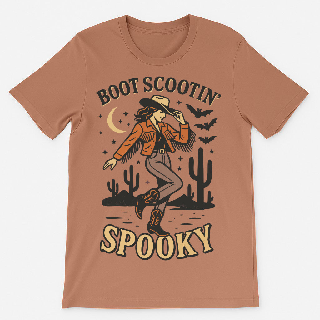 Boot Scootin Spooky cowgirl Halloween t-shirt in rust burnt sienna, Western graphic tee with moon, bats, desert cactus and line dancing cowgirl, fall spooky season shirt