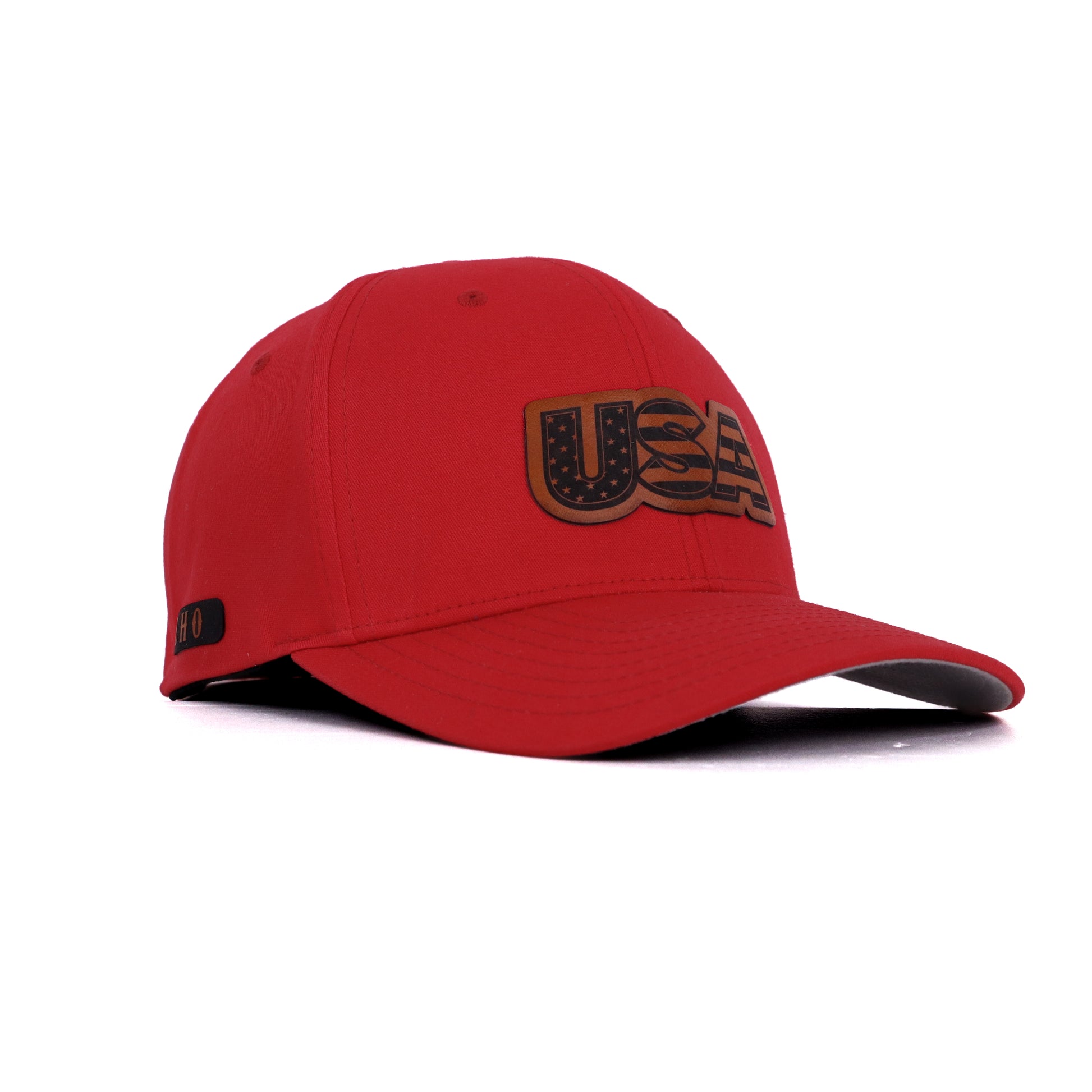 Red USA leather patch hat with patriotic stars and stripes design, angled front view.