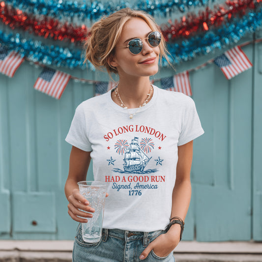 Model wearing white So Long London 1776 patriotic graphic tee with vintage ship design