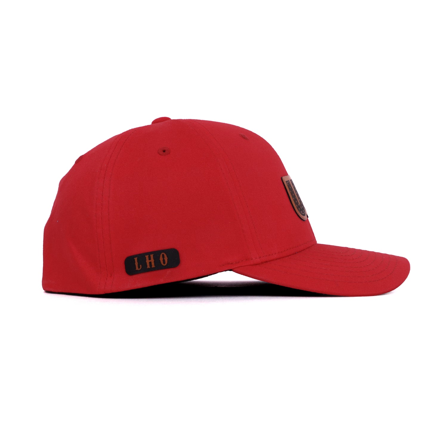 Side view of patriotic red USA hat with leather patch and LHO engraved branding.