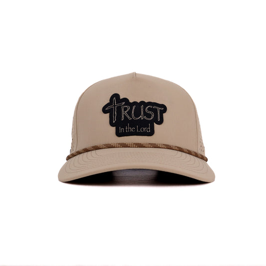 Beige cap with 'Trust in the Lord' embroidery on a white background