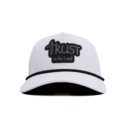 White cap with 'Trust in the Lord' text on a white background