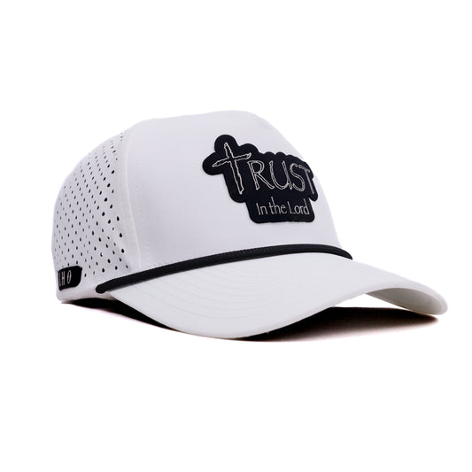 White cap with 'Trust In The Lord' text on a white background