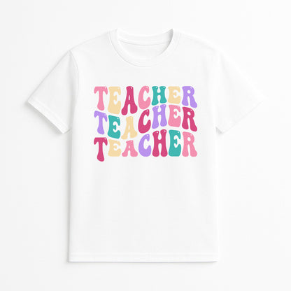 White t-shirt with 'Teacher Teacher Teacher' text in colorful letters on a white background