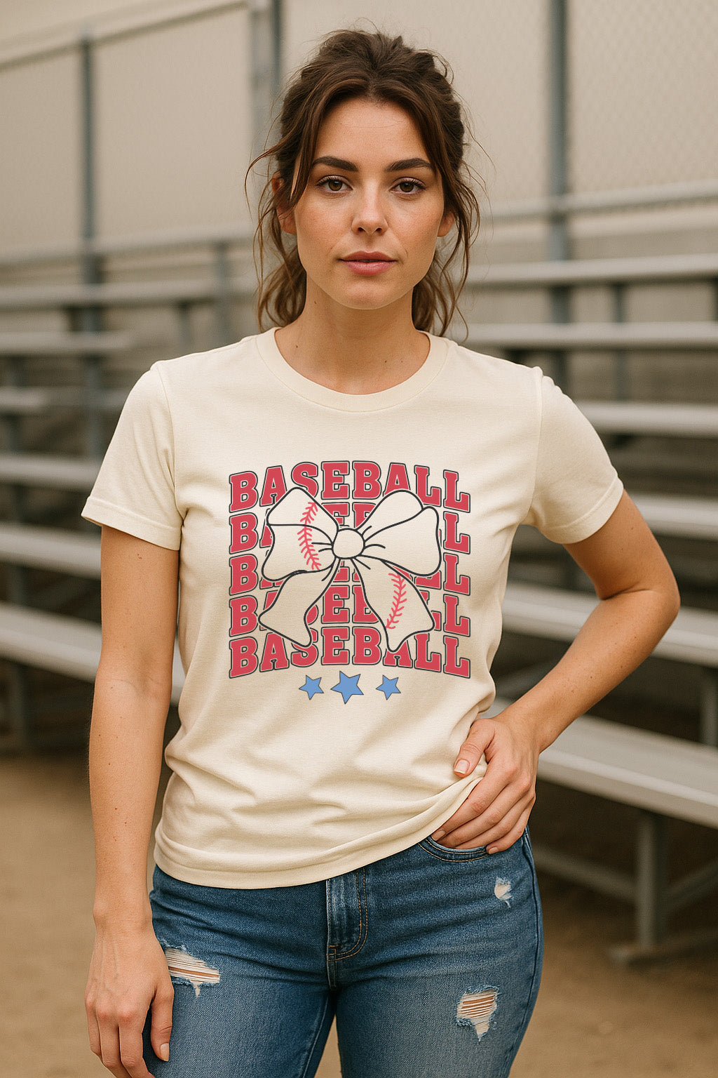 Woman wearing coquette baseball bow graphic tee in natural color, perfect softball mom or game day shirt, retro style