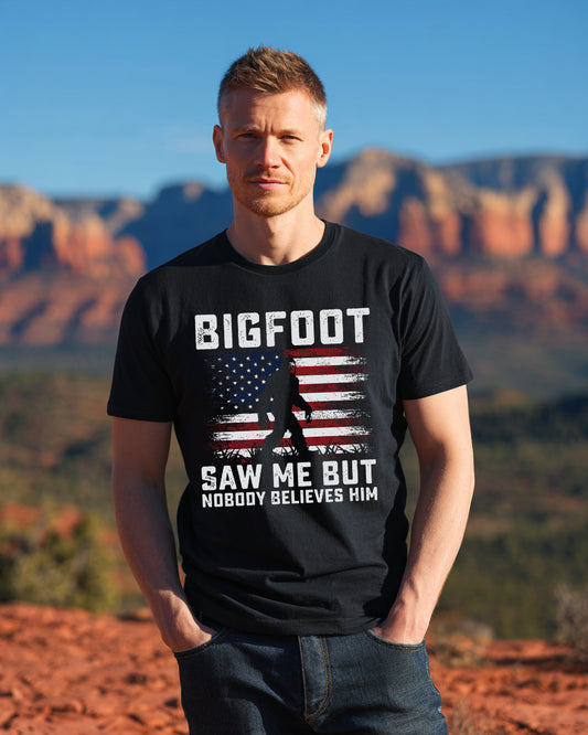 Model wearing black Bigfoot saw me but nobody believes him patriotic graphic t-shirt