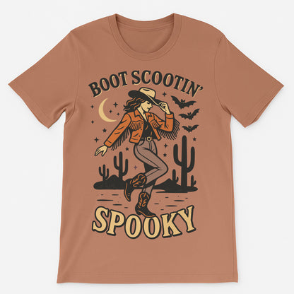 Boot Scootin Spooky cowgirl Halloween t-shirt in rust burnt sienna, Western graphic tee with moon, bats, desert cactus and line dancing cowgirl, fall spooky season shirt