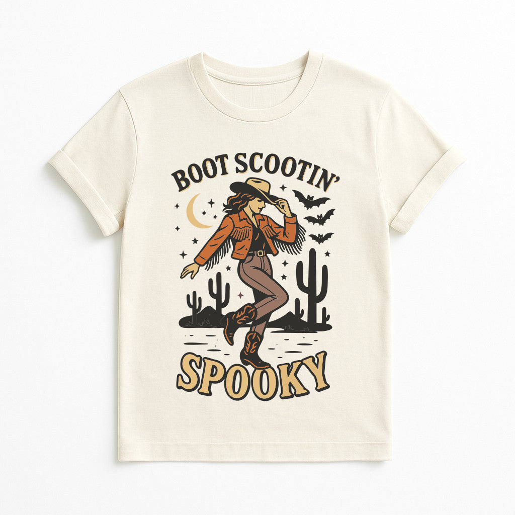 Boot Scootin Spooky Halloween t-shirt in natural color, cowgirl line dance graphic tee with desert cactus and bats, Western spooky season shirt for women