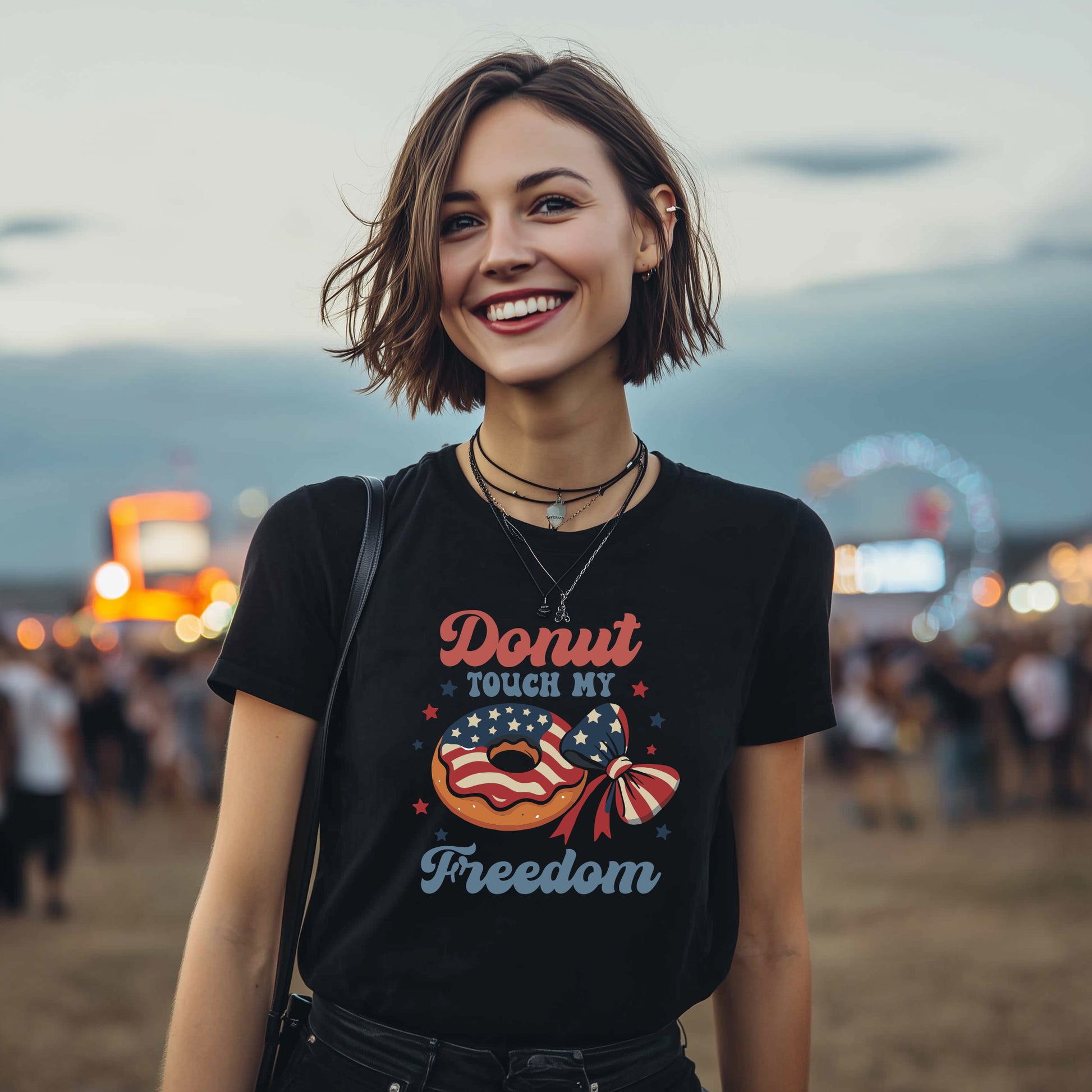 Model wearing black Donut Touch My Freedom patriotic t-shirt with American flag donut graphic