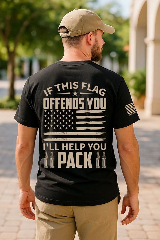 Man wearing black patriotic t-shirt with bold If This Flag Offends You I'll Help You Pack slogan, distressed American flag graphic and sleeve flag print, conservative pro-America shirt