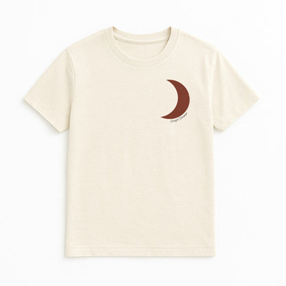 Kick Dust Chase Dreams t-shirt front design in bone color, Western crescent moon chest print with cowboy dreamer script, minimalist country graphic tee