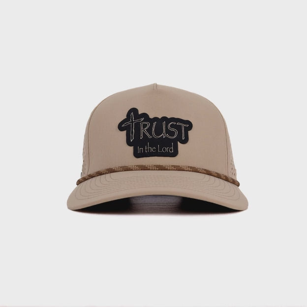Khaki snapback hat with black leather 'Trust in the Lord' patch from the Unshaken Collection by Lonestar Heritage Outpost, faith-based headwear for men