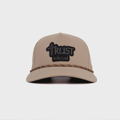 Khaki snapback hat with black leather 'Trust in the Lord' patch from the Unshaken Collection by Lonestar Heritage Outpost, faith-based headwear for men
