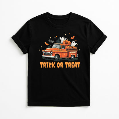 A black short-sleeve crewneck t-shirt featuring a graphic of an orange vintage pickup truck carrying pumpkins and ghosts, with the text 'TRICK OR TREAT' printed below in orange.